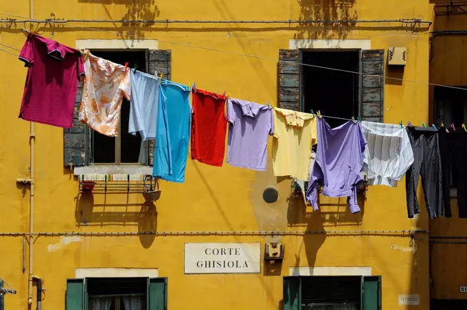 Clothes hanging on a washing line between houses, Venice, UNESCO World Heritage Site, Veneto, Italy, Europe