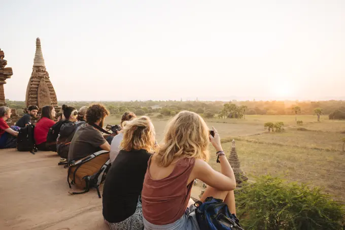 Tourists enjoying the sunset from Temple, Bagan (Pagan), Mandalay Region, Myanmar (Burma), Asia