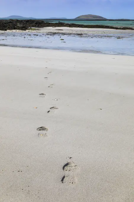 Footsteps on a beach, Isle of Eriskay, Sound of Barra, Outer Hebrides, Scotland, United Kingdom, Europe