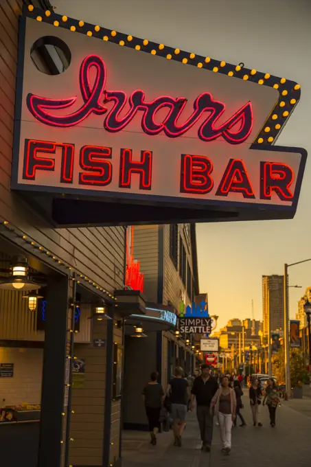 Neon Lights at Pier 54 during the golden hour before sunset, Alaskan Way, Downtown, Seattle, Washington State, United States of America, North America