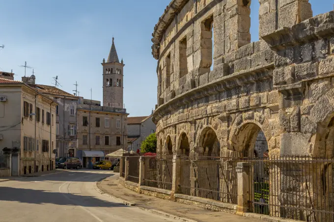 View of Catholic Church next to the Roman Amphitheatre, Pula, Istria County, Croatia, Adriatic, Europe