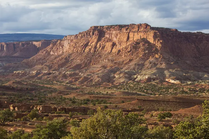 View from Panorama Point across valley to rugged cliffs of the Waterpocket Fold, sunset, Capitol Reef National Park, Utah, United States of America, North America