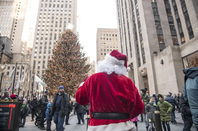 Santa Claus at the Rockefeller Square Christmas tree, Manhattan, New York City, New York, United States of America, North America