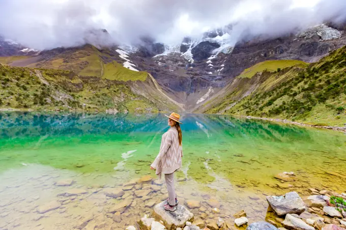 Woman trekking Humantay Lake, Cusco, Peru, South America