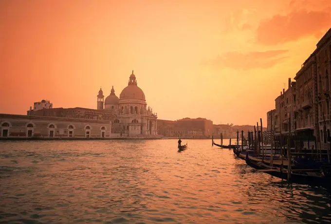 The church of Santa Maria della Salute, from across the Grand Canal at dusk, Venice, UNESCO World Heritage Site, Veneto, Italy, Europe