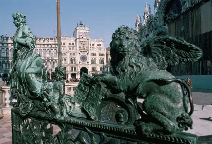 Winged lion and clock tower, St. Mark´s Square, Venice, UNESCO World Heritage Site, Veneto, Italy, Europe