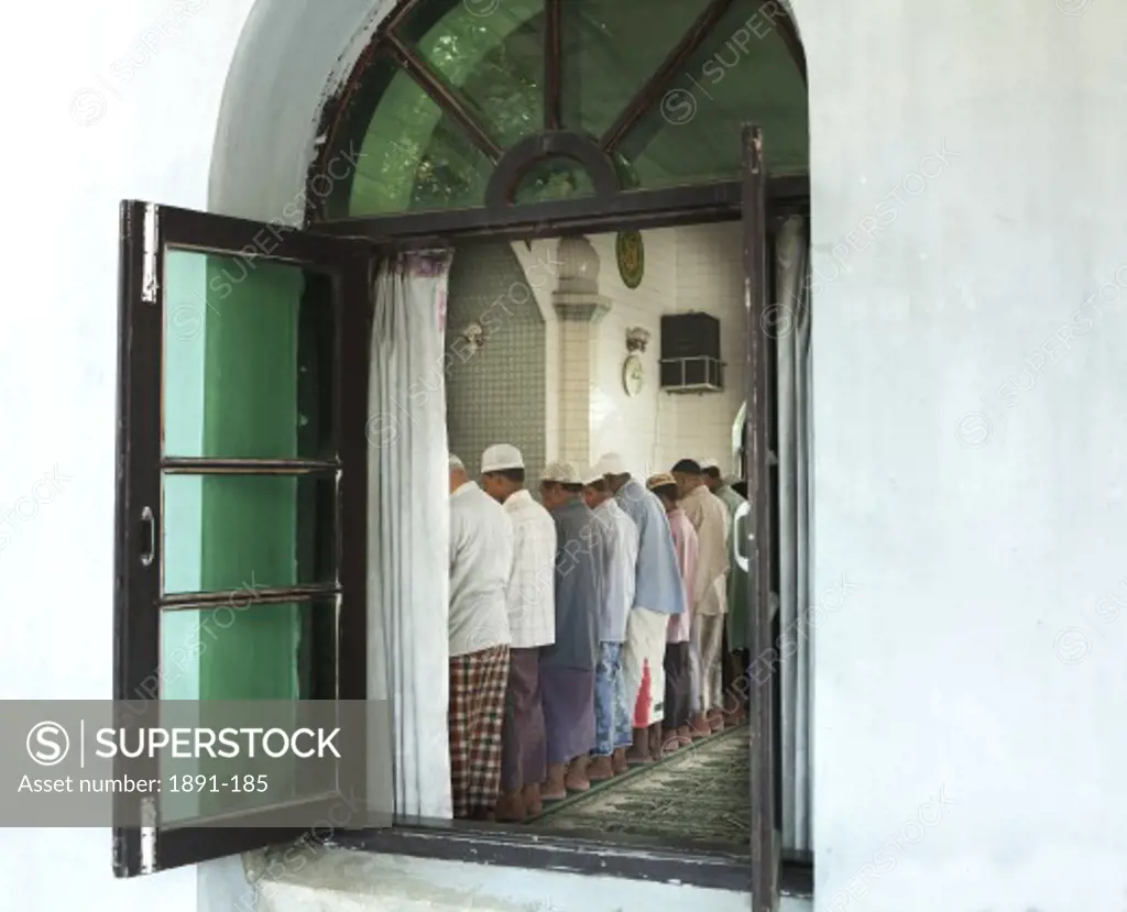 Group of people praying in a mosque, Myanmar