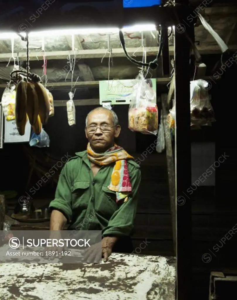 Man selling barbecue, Myanmar