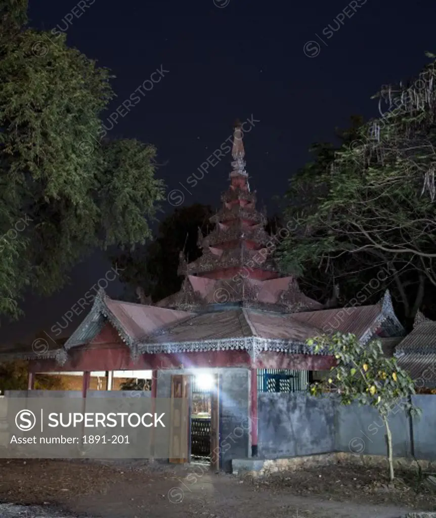 Monastery lit up at night, Myanmar