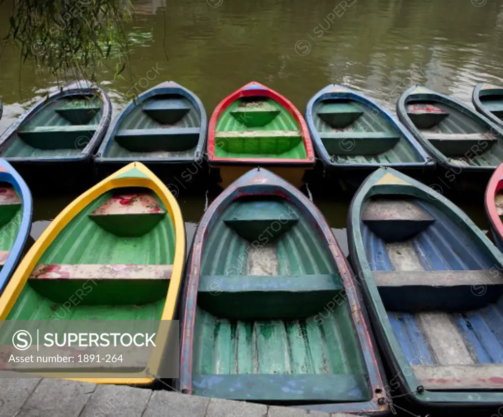 Rental boats moored at a dock, China