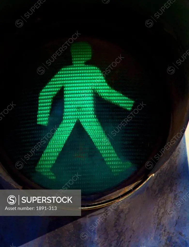 Close-up of a pedestrian crossing light signalling 'Walk' icon, Tibet,