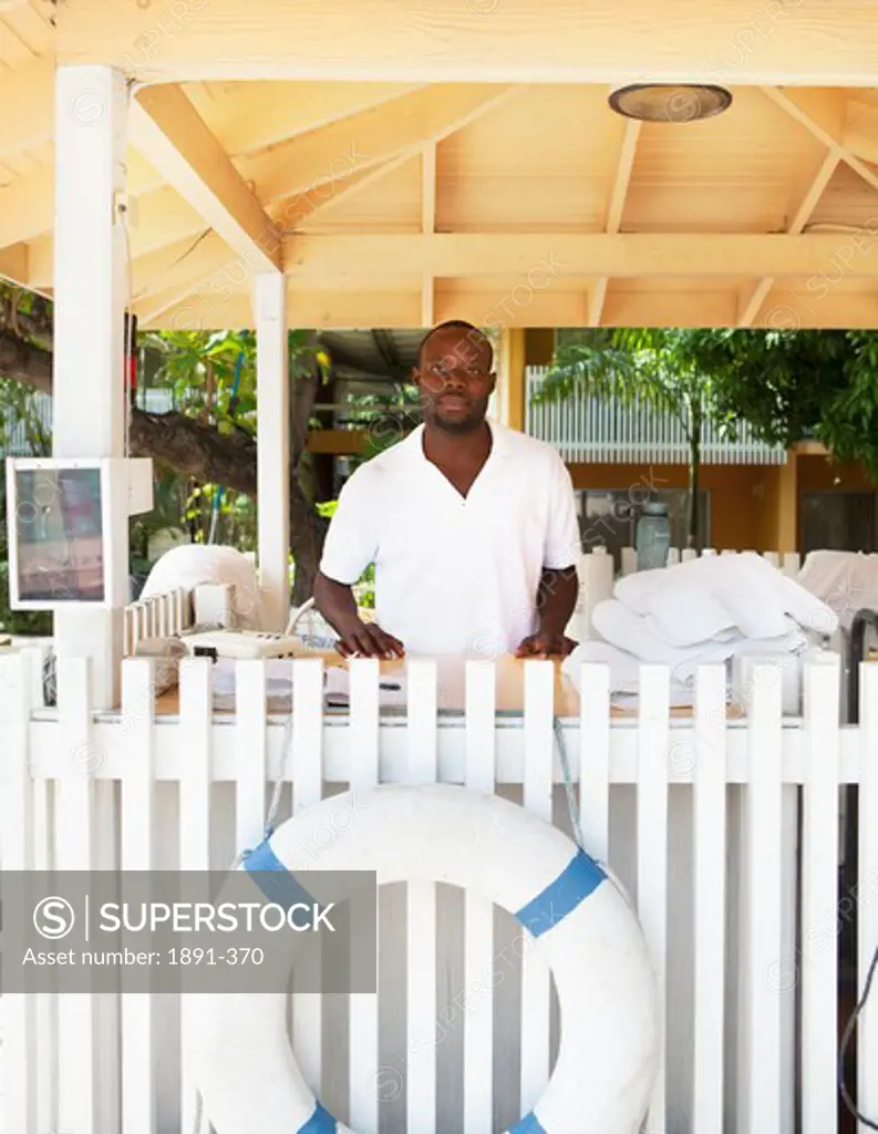 Hotel employee standing in a hotel, Jamaica