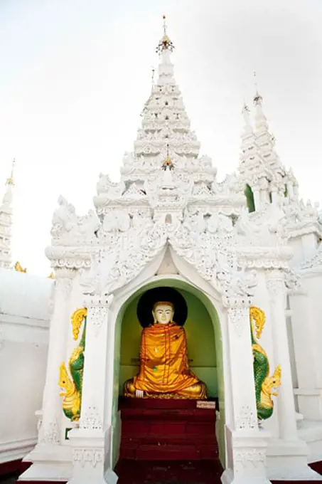 Statue of Buddha in a pagoda, Shwedagon Pagoda, Yangon, Myanmar