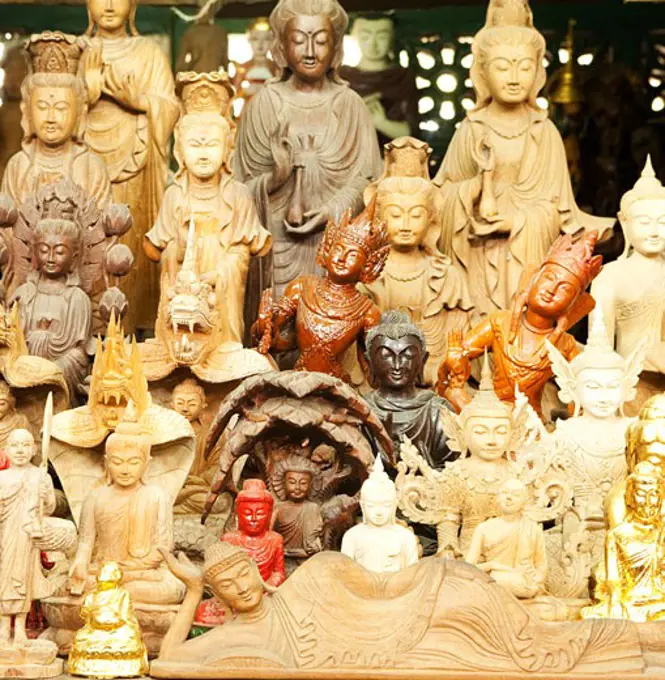 Statues of Buddha at a market stall, Myanmar