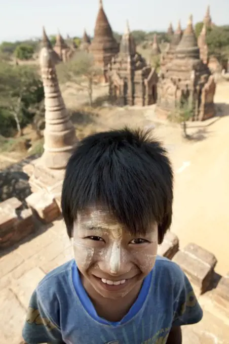 Portrait of a boy at a temple, Bagan Temple, Bagan, Myanmar