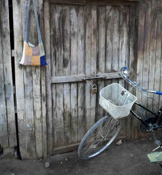 Bicycle in front of a door, Myanmar