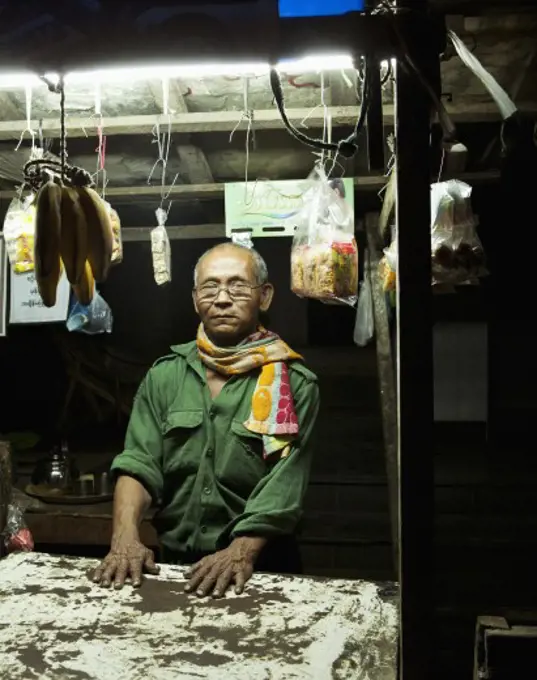 Man selling barbecue, Myanmar