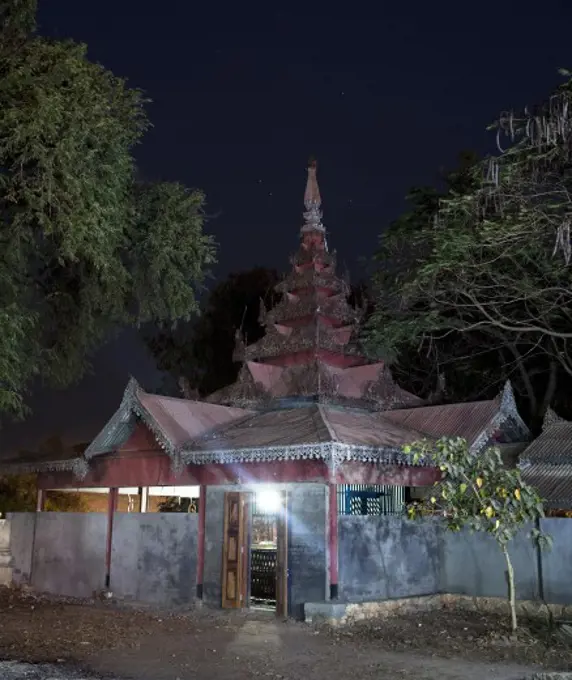 Monastery lit up at night, Myanmar