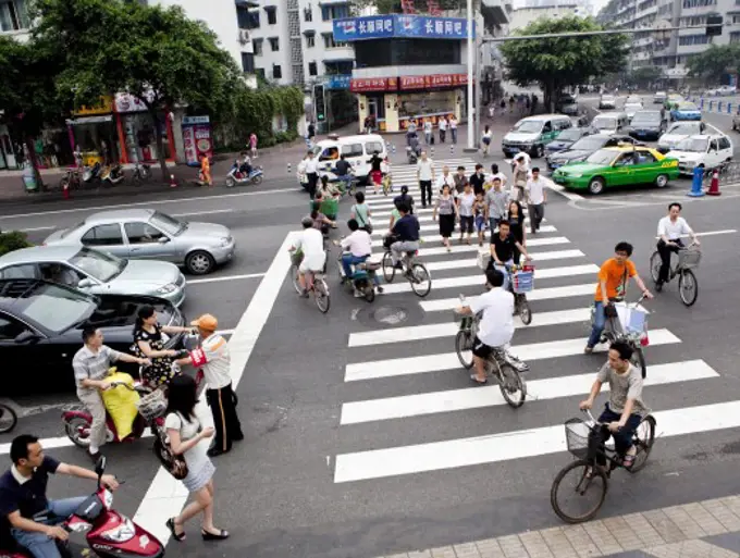 People walking on zebra crossing, Beijing, China