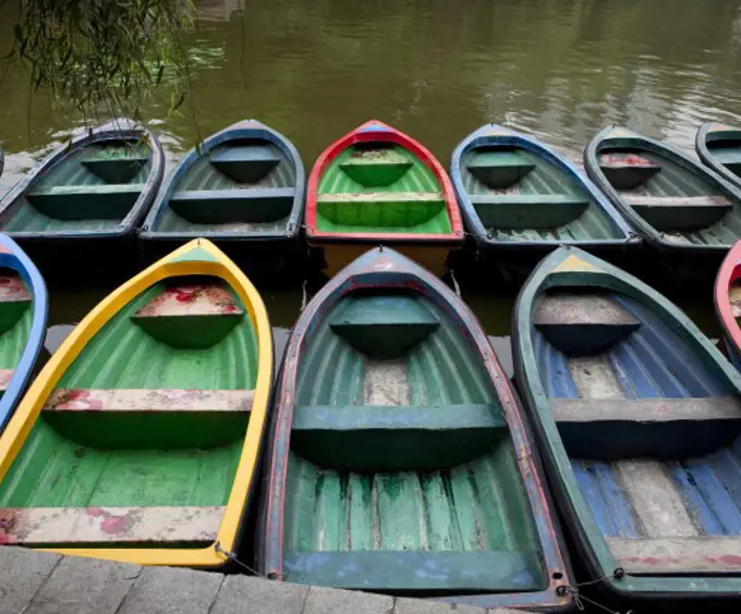 Rental boats moored at a dock, China