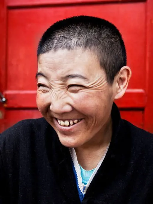 Close-up of a female monk, Tibet,