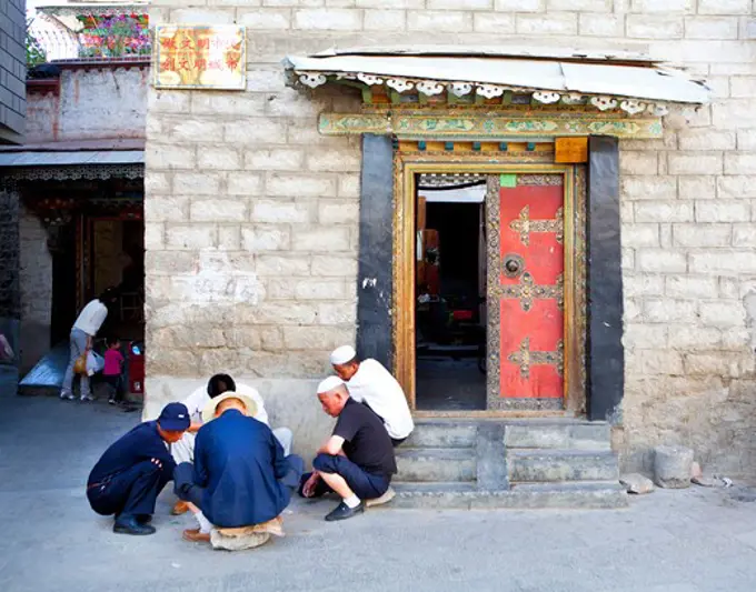 Muslim men gambling, Tibet,