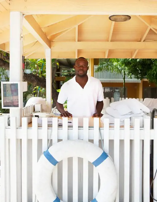 Hotel employee standing in a hotel, Jamaica