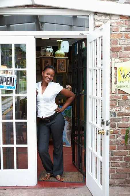 Store owner standing at the doorway, Jamaica