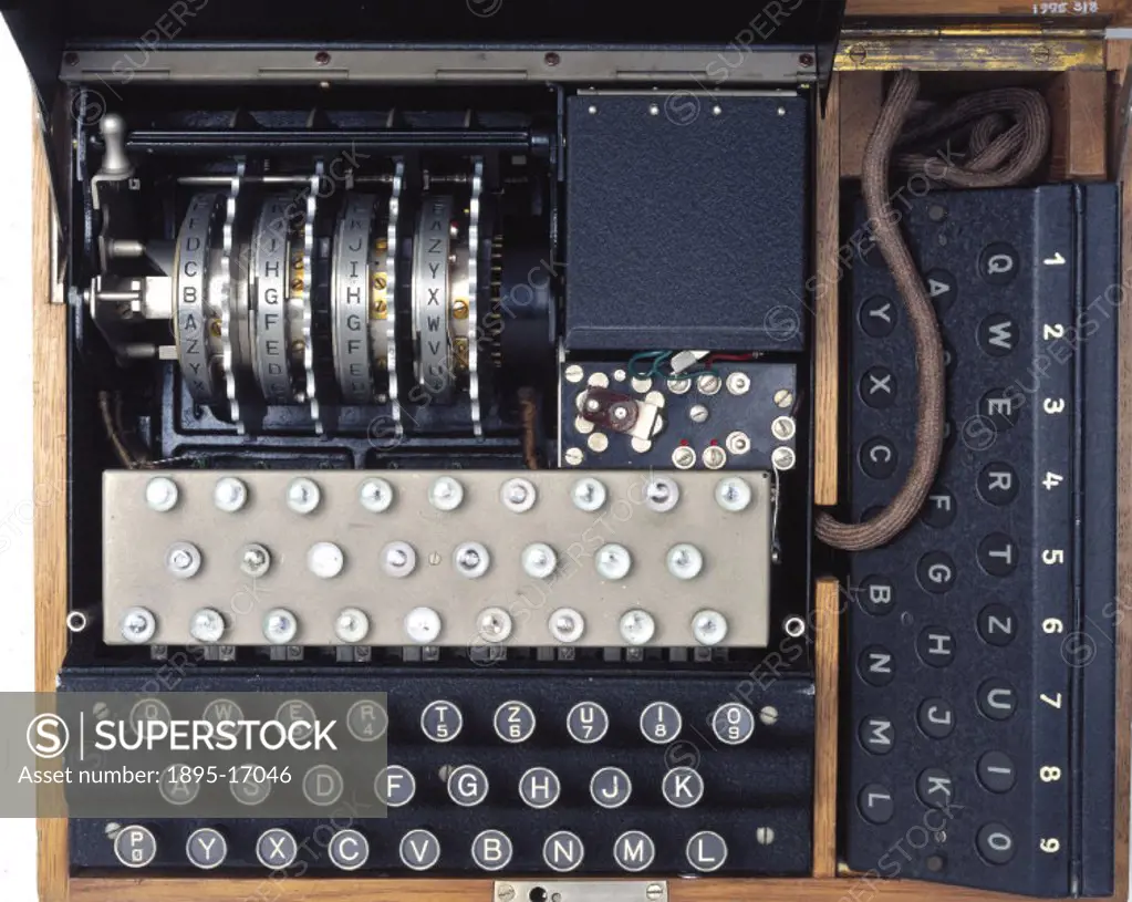 Detail of code wheels and lampboard. A four-rotor German Enigma cypher machine with a second operator display (a ´remote lampboard´), made during Worl...