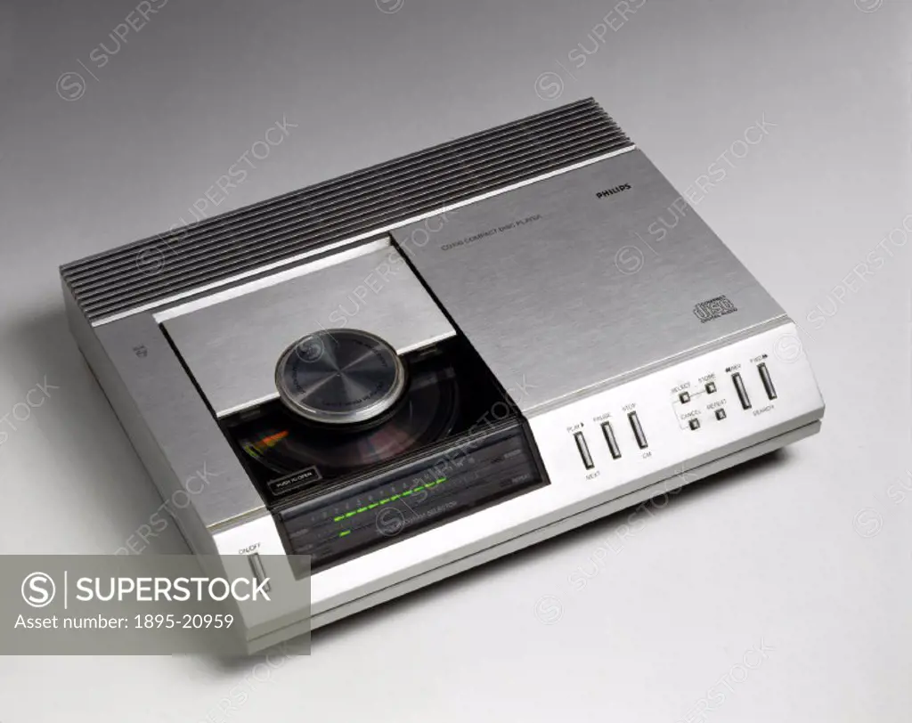 Early compact disc player, 1983. Compact disc (CD) player, Model CD100, made by Philips of Holland. The CD was developed by Philips in conjunction wit...