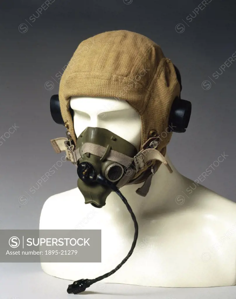 Aertex fabric flying helmet type 22C/747 incorporating electric headphones and oxygen mask, made for the Air Ministry. At the outbreak of WWII (1939-1...