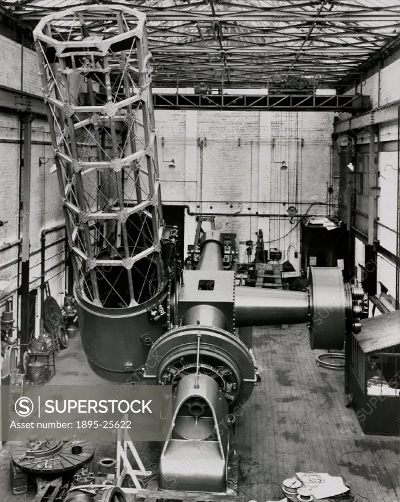 Photograph showing the interior of the optical factory works of the company of Sir Howard Grubb, Parsons and Co in Newcastle-upon-Tyne, England. Dated...