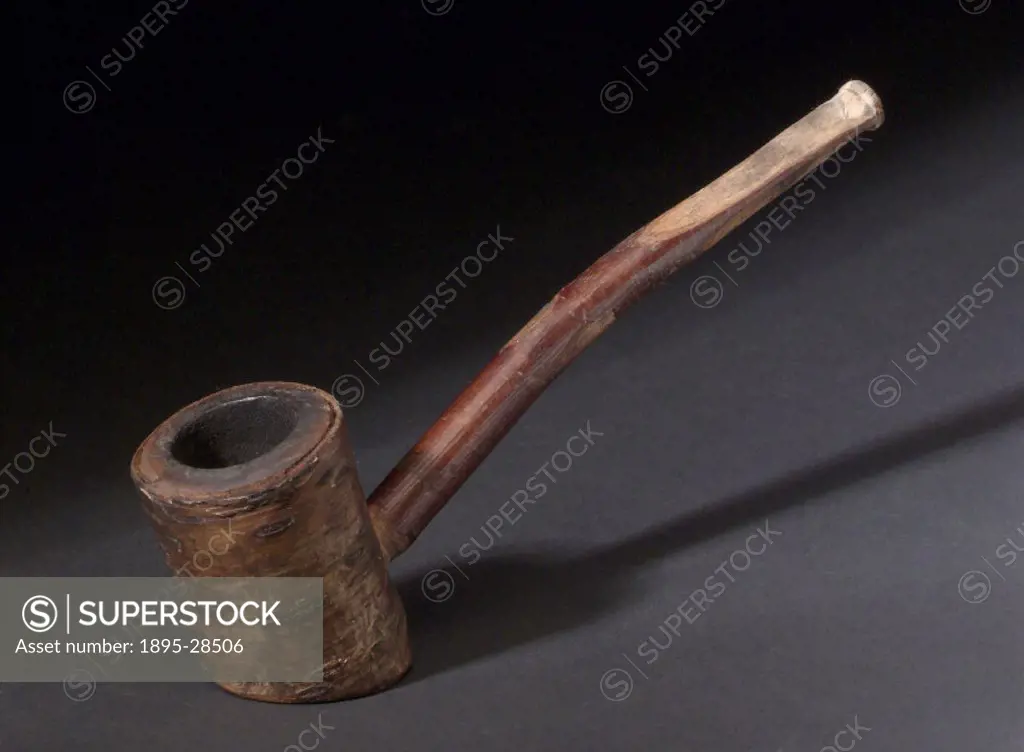 This crudely executed pipe has a cylindrical bowl with flat bottom cut at an acute angle.