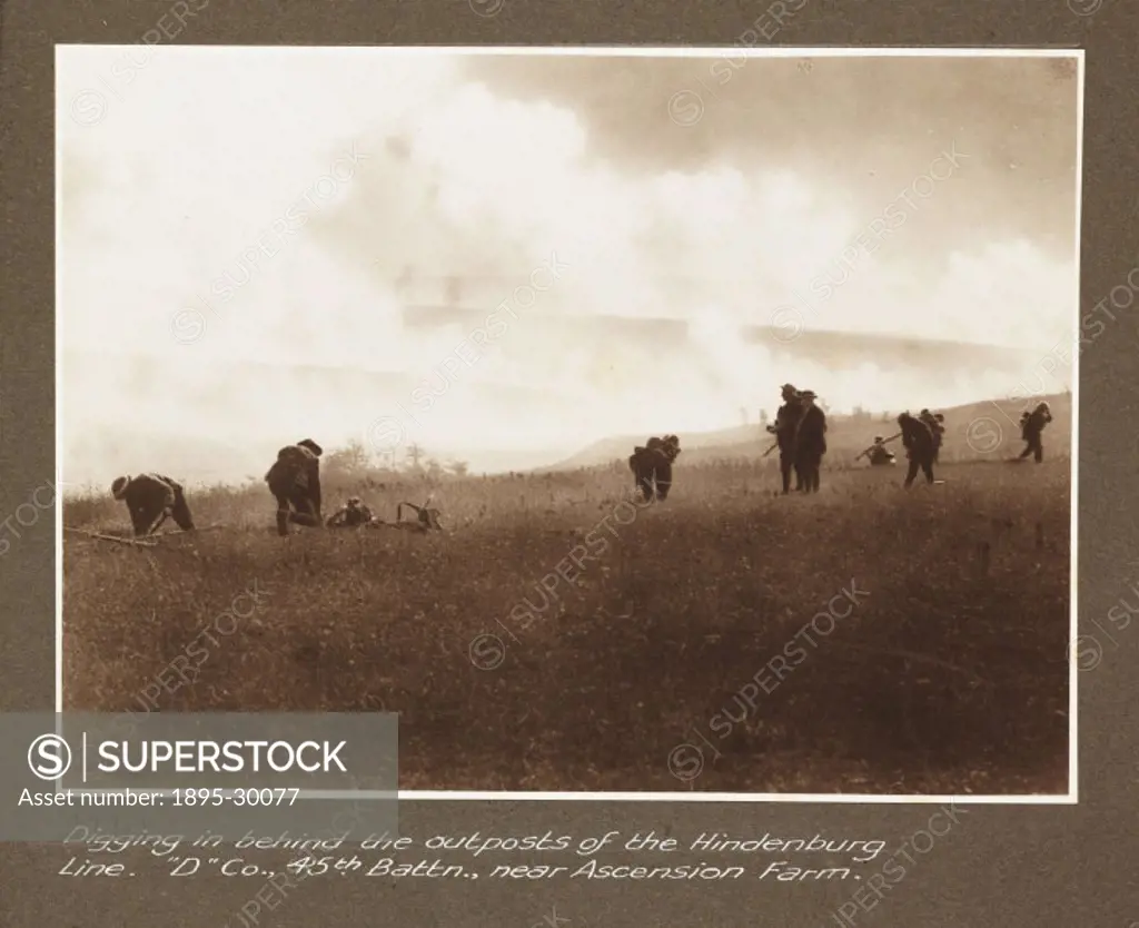 A photograph of Australian soldiers digging trenches, taken by an unknown photographer in about 1917, during World War One.  The full caption reads: ´...