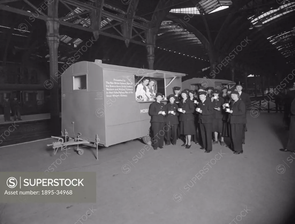 The presentation of two mobile canteens to the Great Western Railway, Paddington station, 28 April 1943.   They were presented by the Buenos Aires Gre...