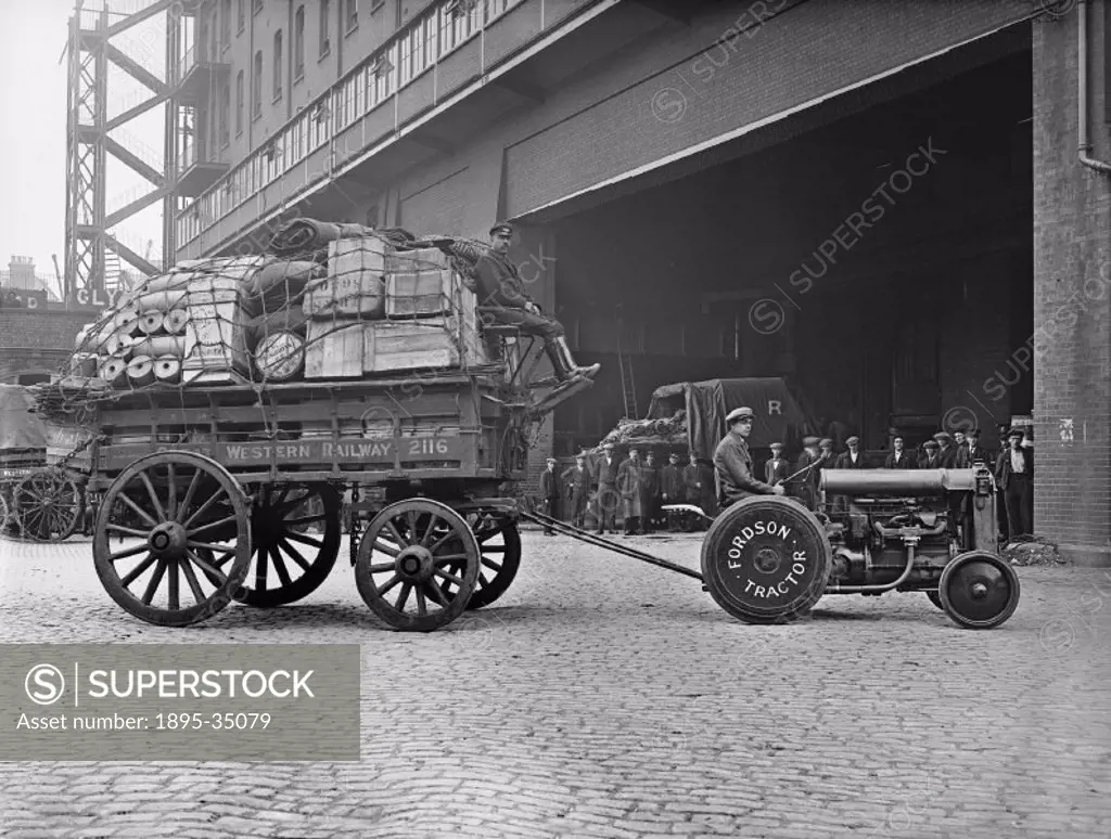 Fully loaded wagon at the Great Western Railway´s Paddington goods depot, being pulled by a Fordson tractor, 1922.   Tractors and mechanical horses we...