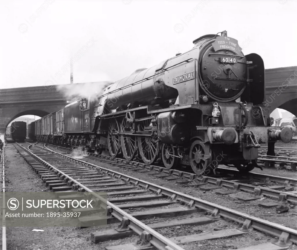 Tees Tyne Freighter, pulled by an A1 class 4-6-0 locomotive number 60140 ´Balmoral´ at King´s Cross station, 1 July 1960. This freight train took good...