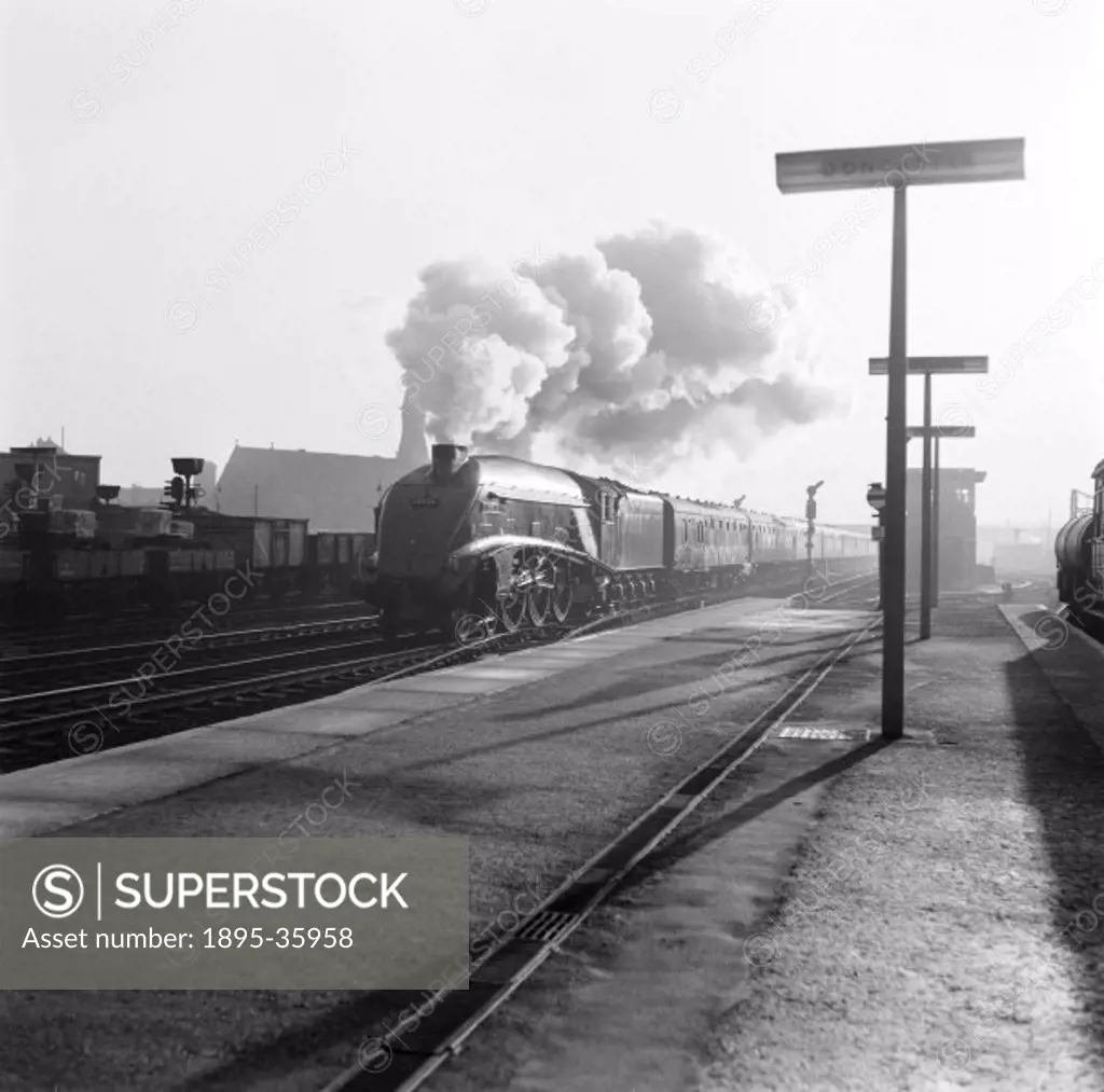 The Flying Scotsman train, pulled by an A4 class 4-6-2 locomotive number 60026 Miles Beevor at Doncaster, South Yorkshire.  The Flying Scotsman left K...