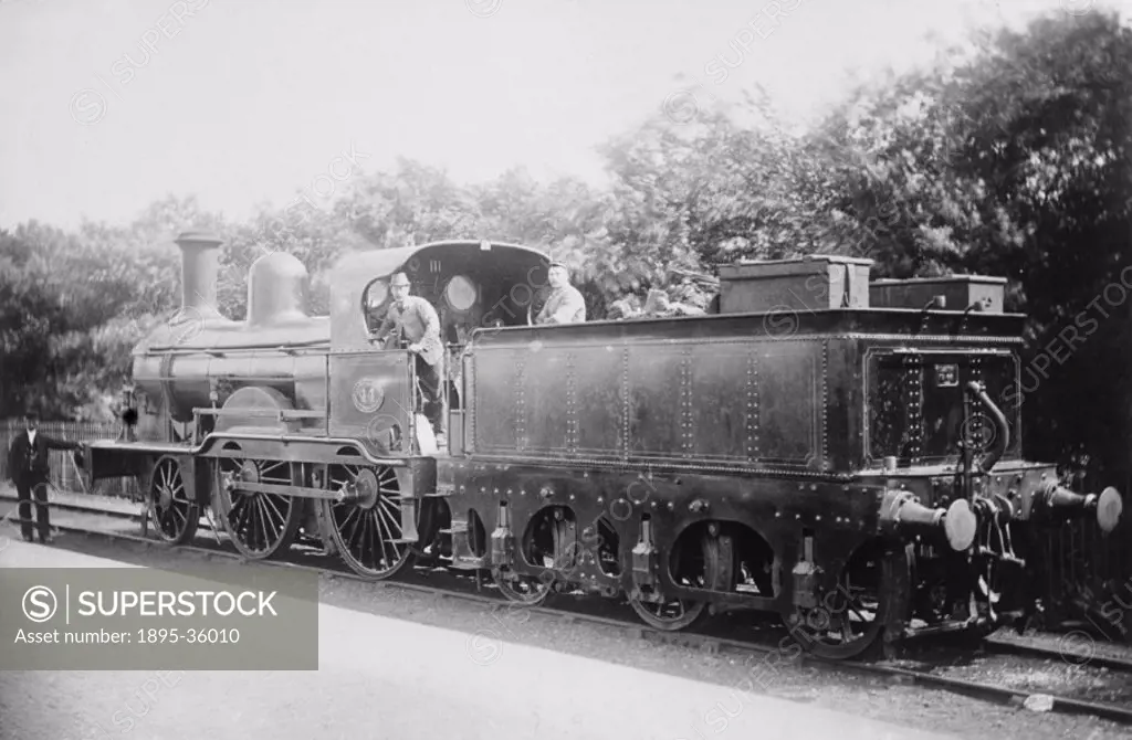 2-4-0 locomotive number 44 with its driver and fireman, about 1880. This locomotive was built at Crewe works. Locomotives had developed fast since 183...