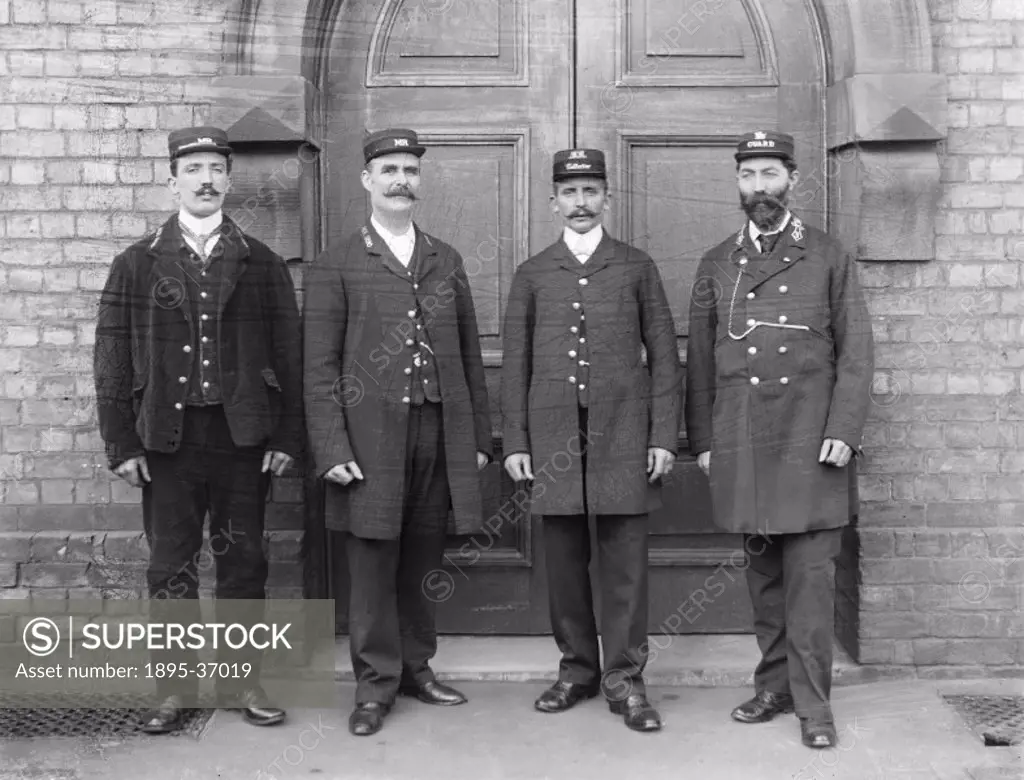 Group of Midland Railway workers wearing new uniforms, about 1902.   All railway staff who came into contact with the public had to wear a uniform con...