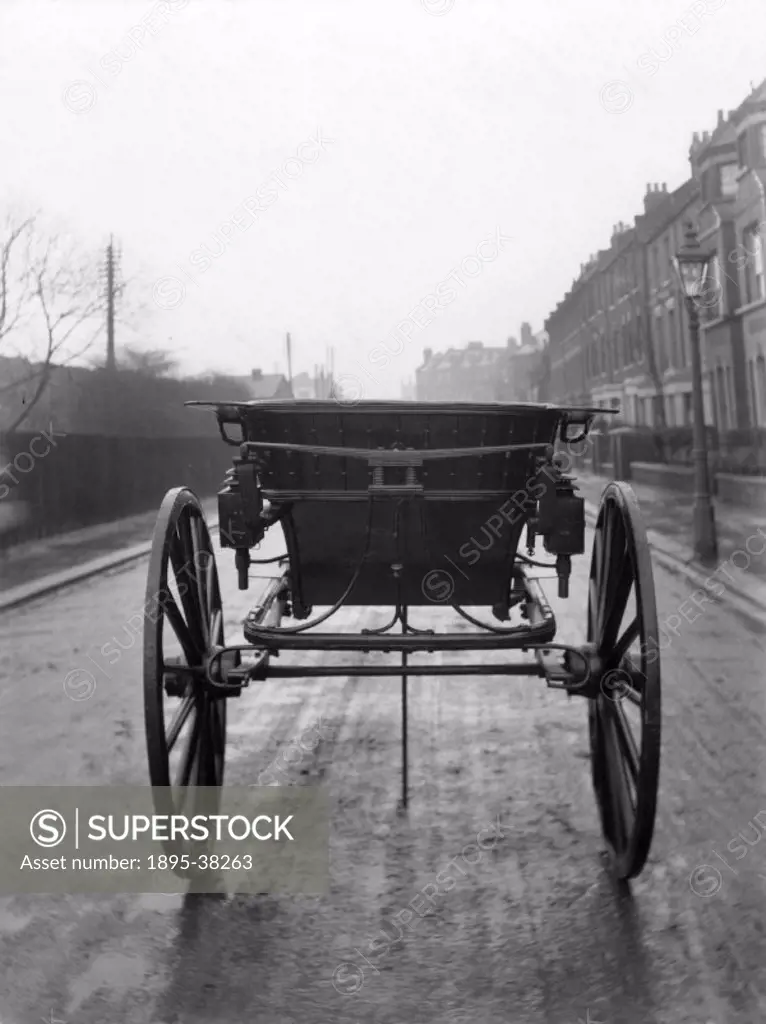 Photograph showing the back view of a Tilbury gig, a light, open, two- wheeled, one-horse carriage popular in France, England and America. Fitzroy Sta...