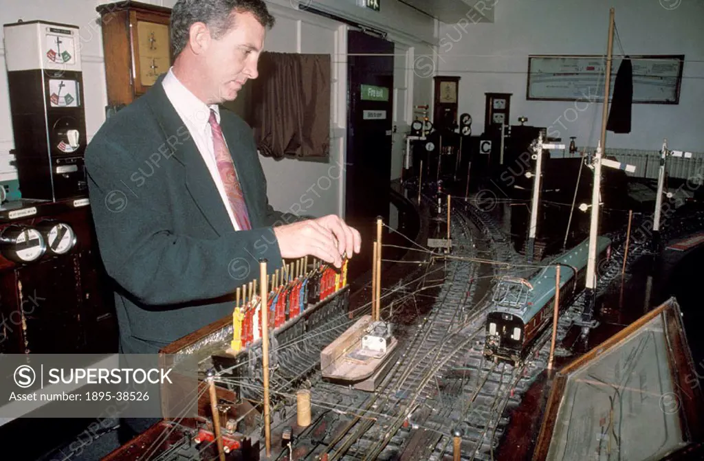 Student at Manchester Victoria´s signalling school, by Lynn Patrick, 1996. Signalling students use models to learn how to work points and the meanings...