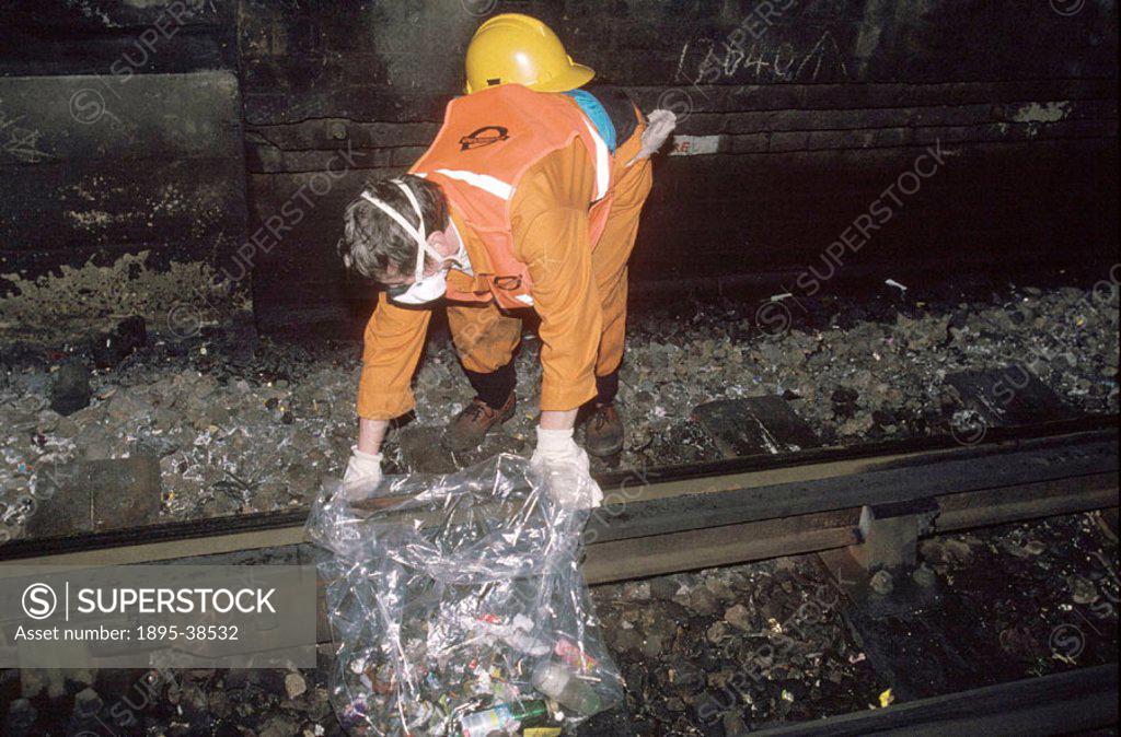 A fluffer’ at work in the London Underground, by Chris Hogg, 1996 ...