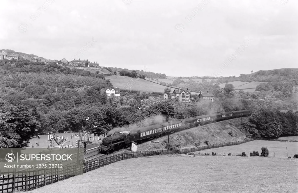 Passenger train at Luddenfoot, West Yorkshire, hauled by a 4-6-0 locomotive, by Eric Treacy, 1957.  At this time British Railways´ modernisation plan ...