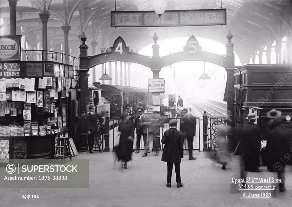 Ticket barrier at Liverpool Street station, 1920.  By the start of the 20th century Liverpool Street was the busiest terminus in London and was dealin...