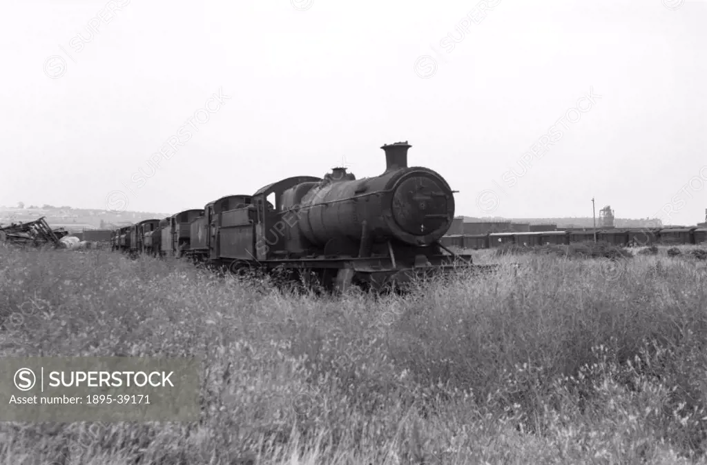 Scrapped locomotive on the former Great Western Railway, by Selwyn Pearce-Higgins, 1966.  Steam locomotives were withdrawn from British Railways in 19...