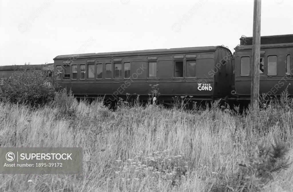 Scrapyard, for locomotives and rolling stock on the former Great Western Railway, by Selwyn Pearce-Higgins, 1966.  Scrap yards were filled with railwa...