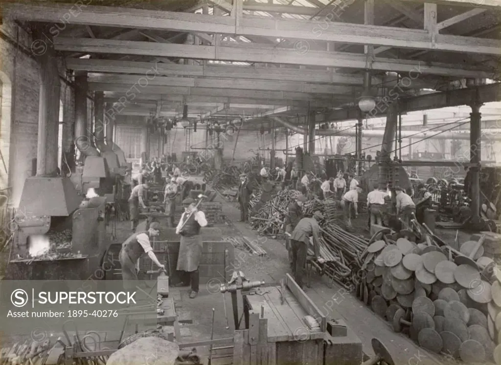 Workers in the forge at Doncaster carriage works. This is where parts for the carriages and wagons were made. This area is where iron was heated and s...