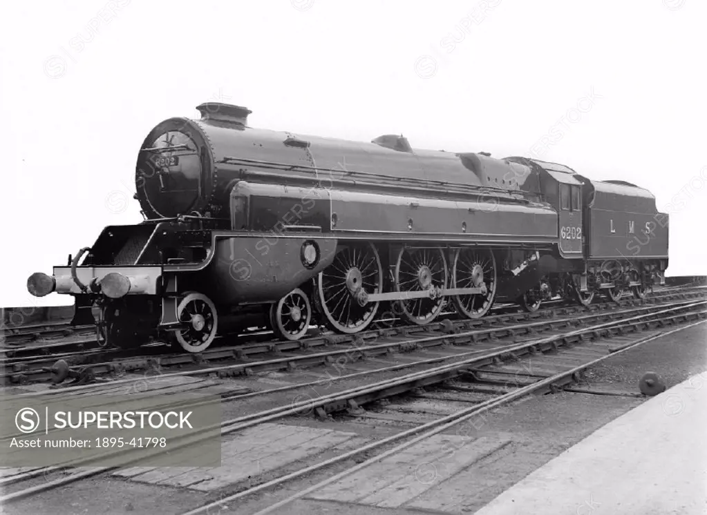 Forward turbine side view of LMS steam turbine locomotive, No. 6202, 4-6-2.