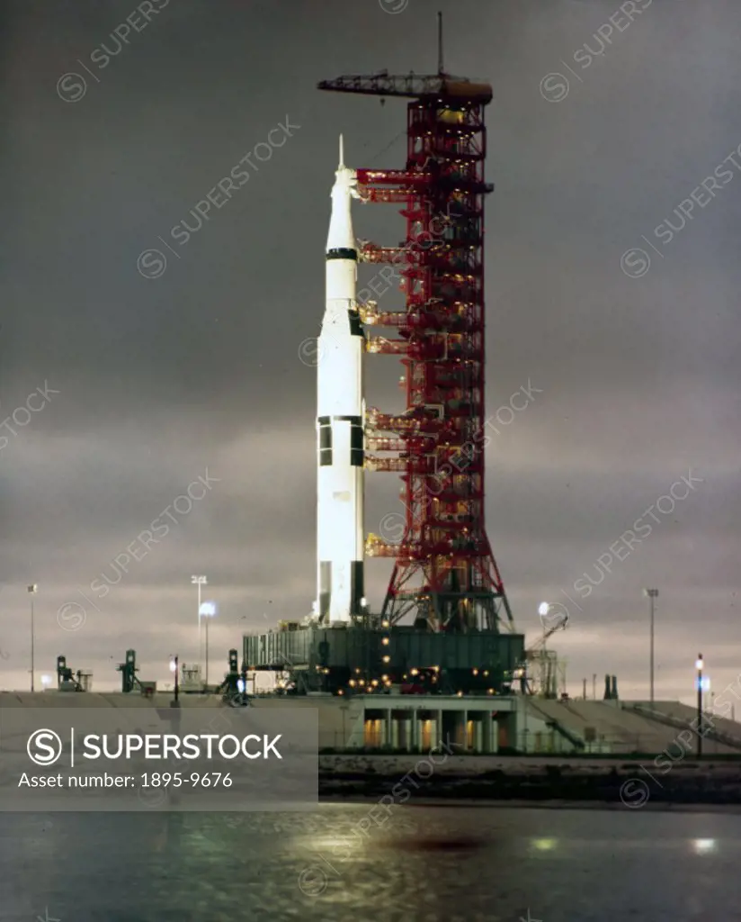 The Apollo 11 rocket is shown floodlit after roll out from the Vehicle Assembly Building at the Kennedy Space Centre, Cape Canaveral, Florida. Apollo ...